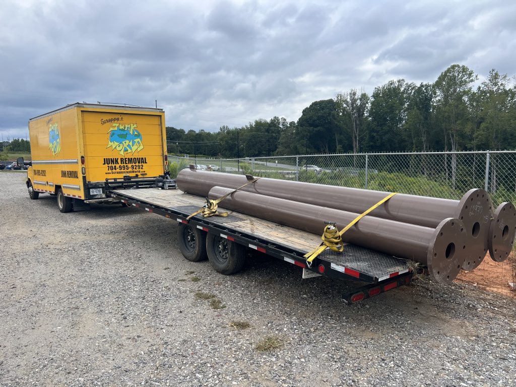 Scrappy's Junk World trailer hauling construction site junk