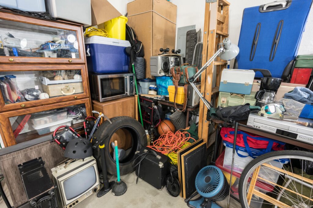 Cluttered,Garage,Corner,Full,Of,Storage,Items,And,Vintage,Electronics.